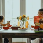 Defuse a tense family dinner.