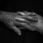 Comfort a dying person with their hand in yours.