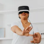 Create a virtual reality experience that simulates the sensation of touch and texture in a realistic way.