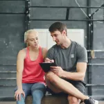 Create a customized exercise plan that adapts to a person's physical limitations and goals over time.