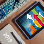 Develop a system that can predict the success of a new product based on social media trends and consumer behavior.